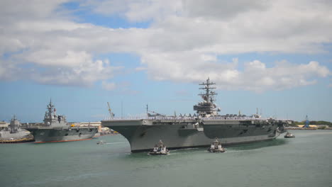 An-Aircraft-Carrier-With-All-Hands-On-Board-Pulls-Into-Pearl-Harbor-Hawaii