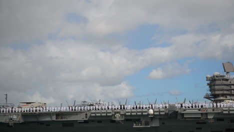 An-Aircraft-Carrier-With-All-Hands-On-Board-Pulls-Into-Pearl-Harbor-Hawaii-1