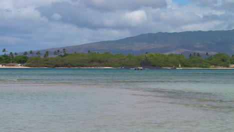 A-Submarine-Passes-Tropical-Beaches-In-Hawaii-1