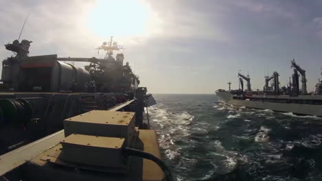 Time-Lapse-Footage-Of-Two-Navy-Ships-In-Parallel-During-A-Replenishing-Exercise