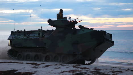 Amphibious-Assault-Vehicle-Tank-Passing-On-A-Beach-During-A-Wartime-Exercise