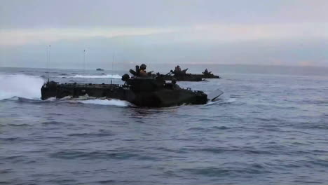 Amphibious-Assault-Vehicle-Tank-Approaching-Beach-During-A-Wartime-Exercise-3