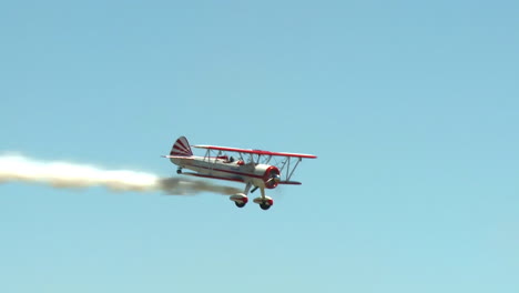 An-Old-Biplane-Thrills-The-Crowd-At-An-Airshow
