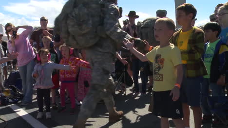Children-Greet-Army-And-Military-Personnel-Returning-From-War