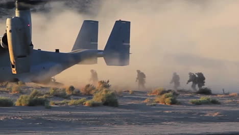 Us-Marines-Board-An-Osprey-Helicopter-In-The-Desert-And-It-Takes-Off