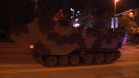 Policía-And-Marines-Roll-Out-Tanks-And-Armored-Vehicles-Through-An-American-City-During-Times-Of-Public-Unrest-And-Rioting-3