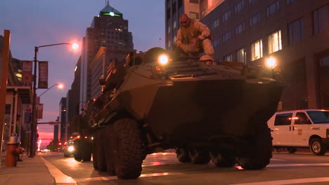 Police-And-Marines-Roll-Out-Tanks-And-Armored-Vehicles-Through-An-American-City-During-Times-Of-Public-Unrest-And-Rioting-5