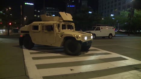 Police-And-Marines-Roll-Out-Tanks-And-Armored-Vehicles-Through-An-American-City-During-Times-Of-Public-Unrest-And-Rioting-7