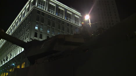 Police-And-Marines-Roll-Out-Tanks-And-Armored-Vehicles-Through-An-American-City-During-Times-Of-Public-Unrest-And-Rioting-12