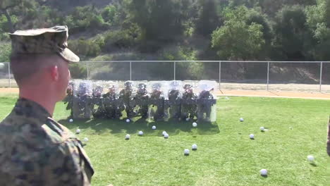 Troops-Practice-Being-Hit-By-Thrown-Objects-During-A-Riot