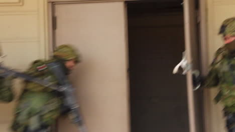 A-Marine-Swat-Team-Performs-A-Simulated-Hostage-Rescue-Mission-2