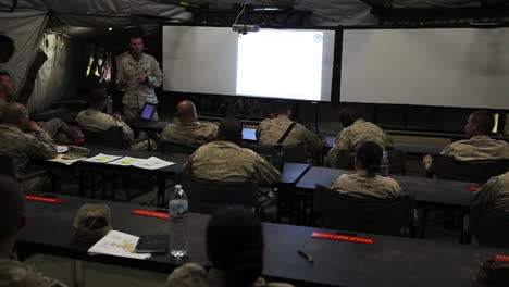 Us-Troops-Are-Briefed-On-A-Mission-Inside-A-Large-Army-Tent