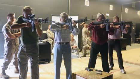 Former-California-Governor-Pete-Wilson-Fires-Guns-With-The-Army-At-A-Photo-Op