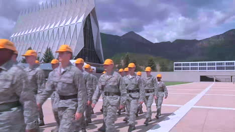 Recent-Graduates-Walk-In-Formation-In-Front-Of-The-Air-Force-Academy-In-Colorado