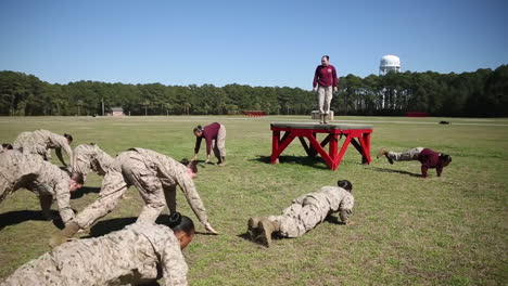 Female-Soldiers-In-Basic-Training-Do-Exercises-On-An-Outdoor-Field-1