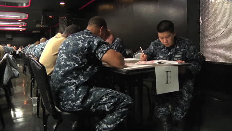 Military-Second-Class-Petty-Officers-Take-A-Test-To-Become-First-Class-Petty-Officers