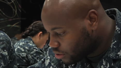 Military-Second-Class-Petty-Officers-Take-A-Test-To-Become-First-Class-Petty-Officers-1