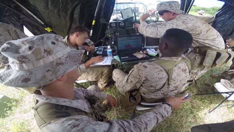 Us-Troops-At-Work-At-A-Mobile-Command-Center-In-The-Field-1