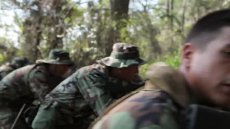Us-Navy-Strike-Force-With-South-American-Paraguay-Soldiers-In-A-Riverine-Maneuver-In-A-Jungle-Environment