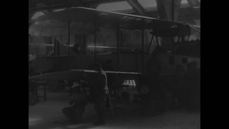 Airplanes-And-Blimps-Are-Rolled-Out-Of-A-Factory-In-Italy-In-1914