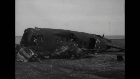 Soldiers-Look-At-The-Destroyed-Wreckage-Of-Planes-And-Other-War-Materials-From-The-Pacific-Islands-During-World-War-Two-1