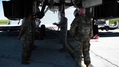 Members-Of-The-A4-Air-Force-Global-Strike-Command-Prepare-Missiles-For-Loading-Onto-An-Aircraft-2019