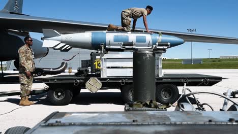 Members-Of-The-A4-Air-Force-Global-Strike-Command-Load-Missiles-Onto-An-Aircraft-2019