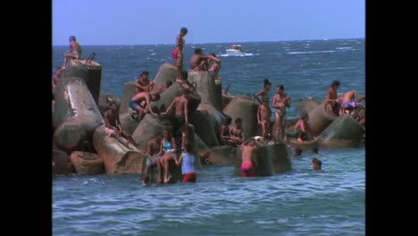 Crowds-swim-in-the-summer-heat-of-Havana-Cuba-in-the-1980s