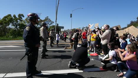 Extreme-Slo-Mo-Protesters-Chanting-And-Standing-Off-With-Police-And-National-Guard-During-A-Black-Lives-Matter-Blm-Parade-In-Ventura-California