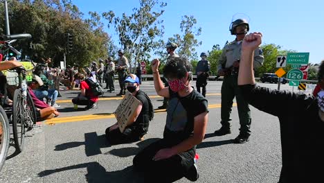 Extreme-Slo-Mo-Protesters-Chanting-And-Standing-Off-With-Police-And-National-Guard-During-A-Black-Lives-Matter-Blm-Parade-In-Ventura-California-2