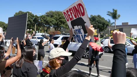 Extreme-Slo-Mo-Signs-Say-Defund-The-Police-During-A-Black-Lives-Matter-Blm-March-In-Ventura-California