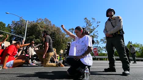 Extreme-Slo-Mo-Protesters-Chanting-And-Standing-Off-With-Police-And-National-Guard-During-A-Black-Lives-Matter-Blm-Parade-In-Ventura-California-7
