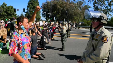 Extreme-Slo-Mo-Protesters-Chanting-And-Standing-Off-With-Police-And-National-Guard-During-A-Black-Lives-Matter-Blm-Parade-In-Ventura-California-9