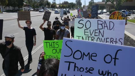 Slow-Motion-Protesters-Chanting-And-Marching-On-Street-With-Protest-Signs-During-A-Black-Lives-Matter-Blm-Parade-In-Ventura-California-2