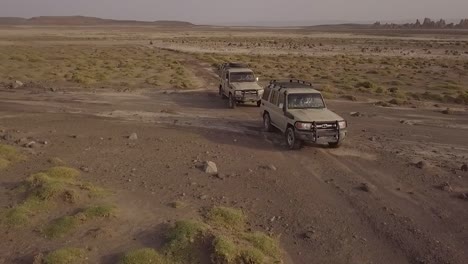 Beautiful-Aerial-Over-Two-4X4-Jeeps-Traveling-Across-The-Deserts-Of-Djibouti-Or-Somalia-3