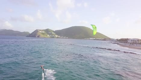 A-Drone-Aerial-Windsurfer-Rides-A-Wave-On-The-Island-Of-St-Kitts-In-The-Caribbean