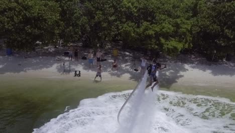 A-Man-Hovers-Using-A-Water-Jetpack-Flyboard-On-The-Ocean-In-Miami-Florida-3