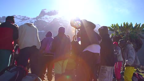 African-Montaña-Guides-And-Porters-Sing-Songs-And-Dance-Before-The-Ascent-Of-Mt-Kilimanjaro