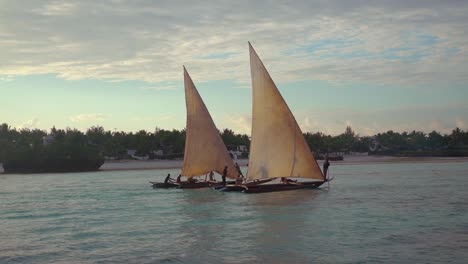 Exotic-And-Beautiful-Dhow-Sailboats-Sail-On-A-River-Or-The-Ocean-In-Zanzibar-Tanzania-Africa