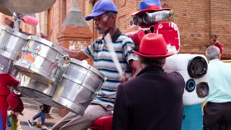 Street-Musicians-Peform-Music-As-A-One-Man-Band-In-Rio-De-Janiero-Brazil