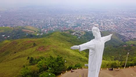 Aerial-Shot-Around-The-Cristo-Rey-Statue-In-Cali-Colombia