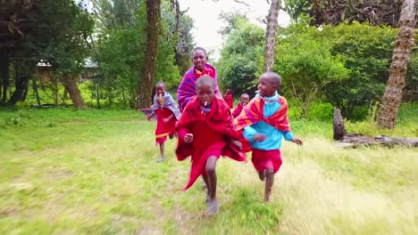 Children-Run-Behind-A-Vehicle-In-Kenya-Africa