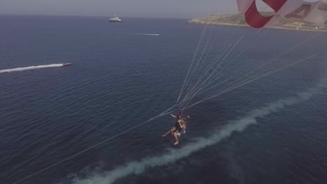 Good-Aerial-Over-A-Parasailing-Boat-On-The-Ocean-In-Malta-1