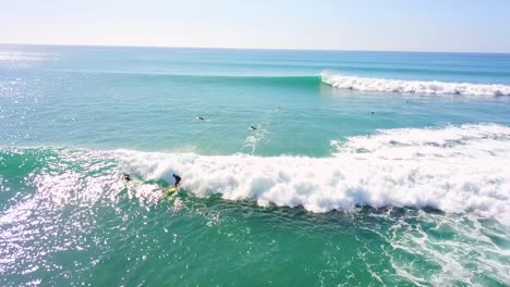 Aerial-Of-Surfers-Catching-Nice-Waves-And-Surfing-In-Cabo-San-Lucas-Baja-Mexico-1