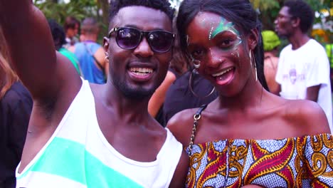 African-Man-And-Woman-With-Painted-Face-Party-And-Celebrate-At-A-Festival-In-Uganda