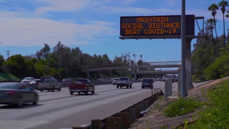 Freeway-Sign-Advises-To-Maintain-Social-Distance-During-Covid19-Corona-Virus-Outbreak-Epidemic