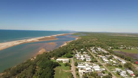 An-aerial-view-shows-housing-near-a-beach-in-the-town-of-Alva-in-Queensland-Australia