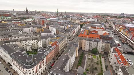 An-aerial-view-shows-the-cityscape-bordering-the-Nyhavn-canal-in-Copenhagen-Denmark