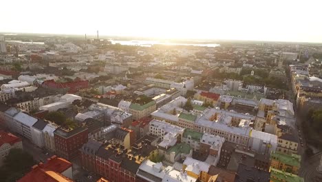 An-aerial-view-shows-the-city-of-Helsinki-Finland-as-sunset-approaches