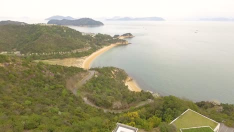 An-aerial-view-shows-the-Chichu-Art-Museum-and-the-coastline-of-Naoshima-Island-in-Japan